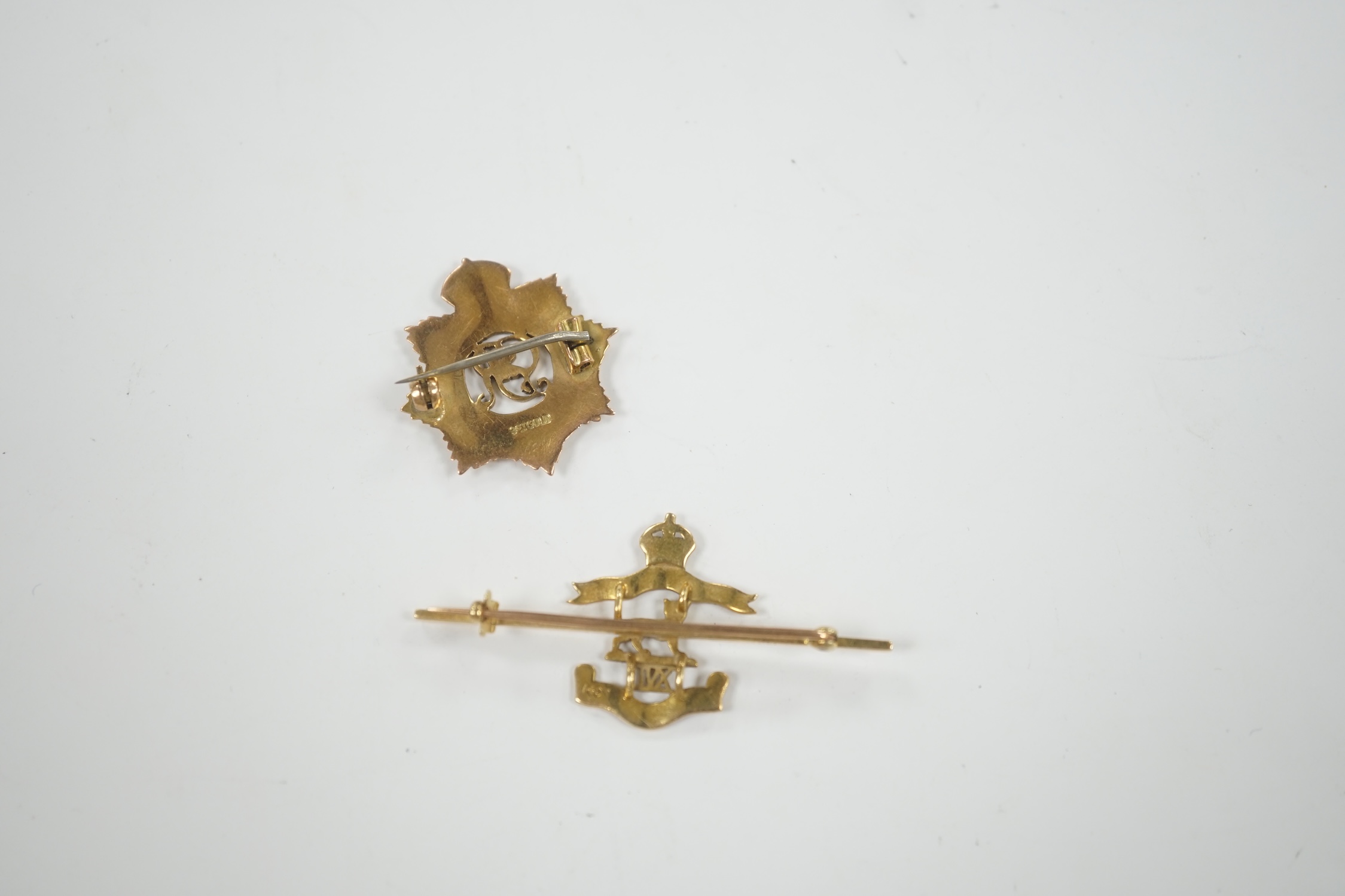 A 14ct and two colour enamel Royal Leicester Regiment sweethearts brooch, 50mm and a 9ct and enamel Royal Army Service Corps badge.